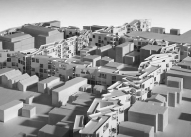 Architectural model, showing the mixed-use development between existing houses and industrial buildings
